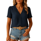 Women's lace V neck blouse with elegant floral detail angled view