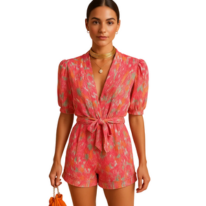 Women's printed summer jumpsuit with belted waist design front view