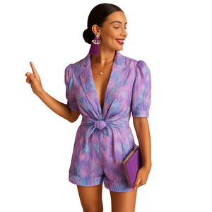 Women's printed summer jumpsuit with belted waist design angled view