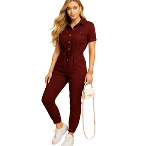 Women's tailored button front jumpsuit paired with heels